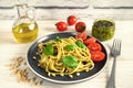 Pasta with fresh homemade pesto sauce and food ingredients Royalty Free Stock Photo