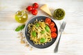 Pasta with fresh homemade pesto sauce and food ingredients Royalty Free Stock Photo