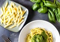 Pasta with fresh homemade pesto sauce and food ingredients. Generative AI Royalty Free Stock Photo