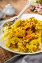 Pasta with fried chicken in cream and chanterelle sauce