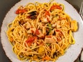 Pasta with fried meat, vegetables and chilli sauce Royalty Free Stock Photo