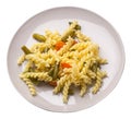 Pasta with green beans with garlicand carrots on a plate isolated on a white background. Mediterranean Kitchen . pasta top view Royalty Free Stock Photo