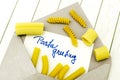 Pasta greeting with various kinds of raw pasta in vintage mood