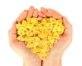 Pasta in hand view heart.