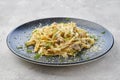 Pasta with honey agarics, onion and cheese Royalty Free Stock Photo