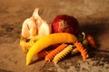 Pasta with ingredients on stone background