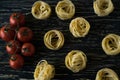 Pasta ingridients and spice on wooden surface. Royalty Free Stock Photo