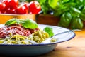 Pasta. Italian and Mediterranean cuisine. Pasta Fettuccine with tomato sauce basil leaves garlic and parmesan cheese. An old home Royalty Free Stock Photo