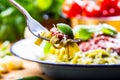 Pasta. Italian and Mediterranean cuisine. Pasta Fettuccine with tomato sauce basil leaves garlic and parmesan cheese. An old home Royalty Free Stock Photo