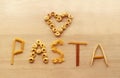 Pasta love, different types of pasta forming the word pasta Royalty Free Stock Photo