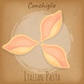 Pasta or macaroni in shape of shell. Italian national cuisine. Conchiglie inscription, noodles