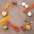 Pasta made from wheat semolina, azuki beans and quinoa with cherry tomates and parmesan cheese on a brown textured background Royalty Free Stock Photo