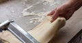 Fresh pasta maker machine. Dough homemade preparation. Hand make dough phylo close up view Royalty Free Stock Photo