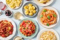 Pasta, many different varieties, overhead flat lay shot. Italian food and drinks