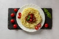 Pasta with meat, tomato sauce and vegetables. Spaghetti bolognese, Italian cuisine. View from above Royalty Free Stock Photo