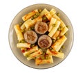 Pasta with meatballs, ketchup and green peas in plate isolated on white. Top view Royalty Free Stock Photo