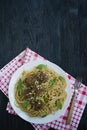 Pasta with meatballs and parsley in tomato sauce. Dark wooden background. View from above Royalty Free Stock Photo