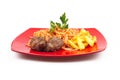 Pasta, meatballs and potatoes on a red plate on white background