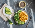 Pasta with minced chicken and slices of vegetables on a light plate Royalty Free Stock Photo