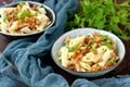 Pasta with mushrooms and  fresh green leaves Royalty Free Stock Photo