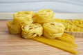 Pasta nests spaghetti scallops, linguini, penne tagliatelle fusilli spirals,