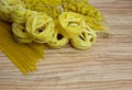 Pasta nests spaghetti scallops linguini penne tagliatelle fusilli spirals.