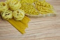 Pasta nests spaghetti scallops linguini penne tagliatelle fusilli spirals.