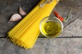 Pasta oil garlic and chili on table Royalty Free Stock Photo