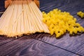 Pasta from the pack on the table scattered. Royalty Free Stock Photo