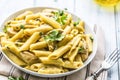 Pasta pene with chicken pieces mushrooms parmesan cheese sauce a Royalty Free Stock Photo