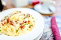 Pasta penne carbonara with bacon and parsley