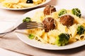 Pasta penne with meatballs and broccoli