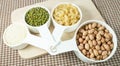Pasta, Rice, Peanuts and Mung Beans in Measuring Cups