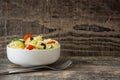 Pasta salad in a bowl on rustic wooden background Royalty Free Stock Photo