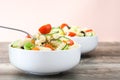 Pasta salad in a bowl on rustic wooden background Royalty Free Stock Photo