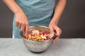 Pasta salad in a bowl, sliced mushroom, tomato, red pepper pieces and tuna, healthy food with vegetables, organic nutrition