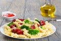 Pasta salad with broccoli and grilled sausages, macro Royalty Free Stock Photo