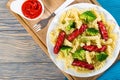 Pasta salad with broccoli and grilled sausages, top view Royalty Free Stock Photo