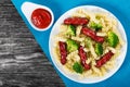 Pasta salad with broccoli and grilled sausages, top view Royalty Free Stock Photo