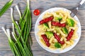 Pasta salad with broccoli and grilled sausages, top view Royalty Free Stock Photo