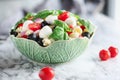 Pasta Salad with Fresh Tomatoes, Black Olives, Mozzarella Balls, and Basil Royalty Free Stock Photo