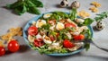 Pasta salad with quail eggs, tomatoes, rucola, mozzarella and basil Royalty Free Stock Photo