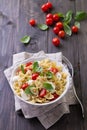 Pasta salad with tomato, mozzarella, pine nuts and basil Royalty Free Stock Photo