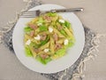 Pasta salad with tuna, lettuce, horseradish cream and basil sprouts Royalty Free Stock Photo