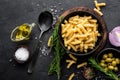 Pasta, salmon fish and ingredients for cooking on black background, top view Royalty Free Stock Photo