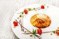 Pasta with sauce and tomatoes in a restaurant close-up. Italian pasta with microgreens on a white plate and copy space Royalty Free Stock Photo