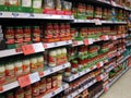 Pasta sauces in jars in a store.