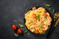 Pasta seafood with shrimp on black table. Royalty Free Stock Photo