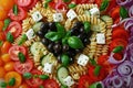 Pasta in the shape heart salad with tomatoes, cucumbers, olives, mozzarella and red onion Greek style Royalty Free Stock Photo