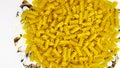 Pasta in the shape of a spiral. Macro photo of pasta. Pasta background. Pasta in bulk Royalty Free Stock Photo